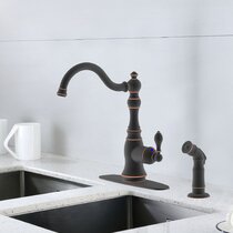 Kitchen faucet deals with side sprayer